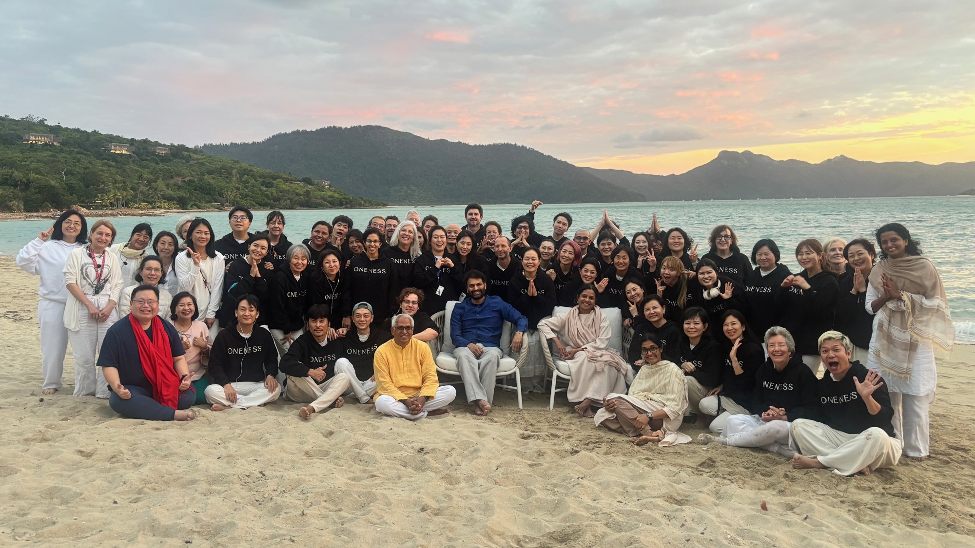Sri Preethaji and Sri Krishnaji with NOA members on the beach at Hayman Island, Australia